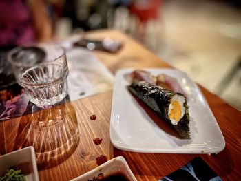 Close-up of food served on table