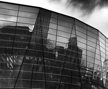 Low angle view of modern building against sky