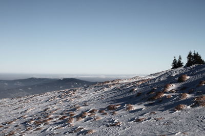 Scenic view of mountains against clear sky