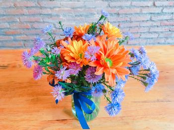 Close-up of flowers in vase on table