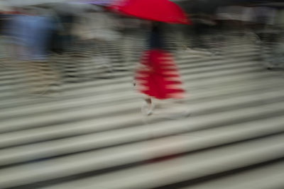 Blurred motion of wet street in rainy season