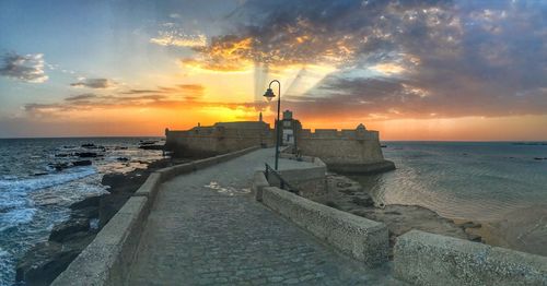 Scenic view of sea at sunset