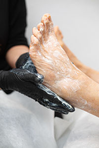 Low section of man washing hands