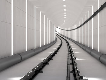 Empty long corridor along railings
