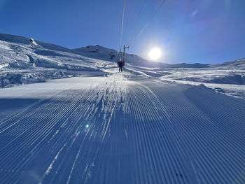 Low angle view of snow covered mountain against sky