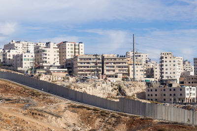 View of buildings in city against sky