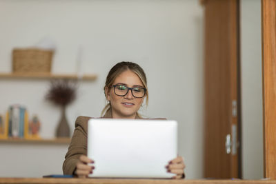 Woman working at home with laptop. home office.  notebook for working. 