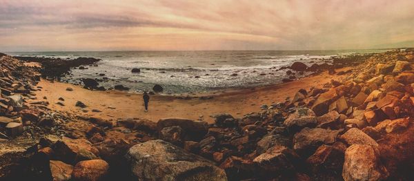 Scenic view of sea at sunset