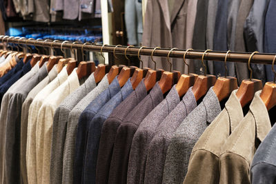 Close-up of clothes hanging on rack