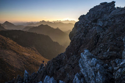 Scenic view of mountains against sky during sunset