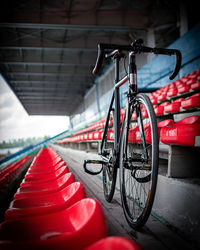 Close-up of bicycle parked in city