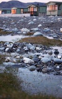 Surface level of stones by river during winter