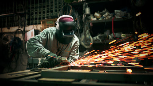 Man working on metal structure