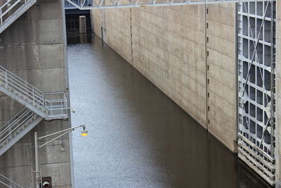 High angle view of bridge over river against buildings