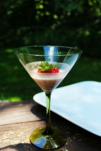 Close-up of wineglass on table