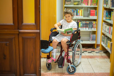 Portrait of boy riding bicycle