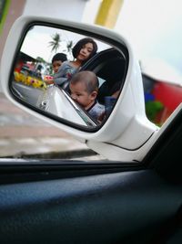 High angle view of people in car