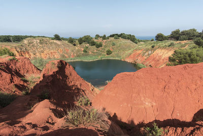 Scenic view of rock formations against sky