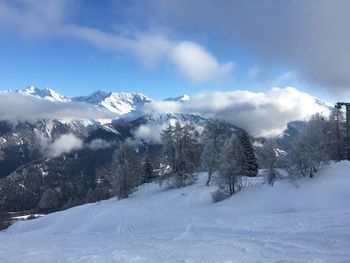 Snow covered mountain against sky