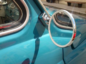 Close-up of car side-view mirror