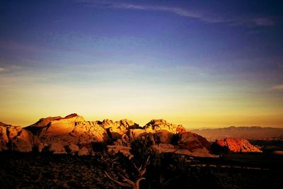 Scenic view of mountains at sunset