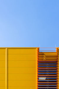 Low angle view of built structure against blue sky