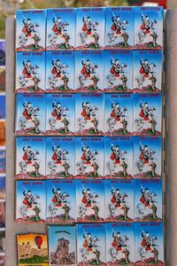 Close-up of books arranged on wall at market stall