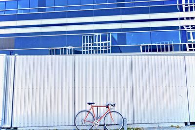 Bicycle against white wall