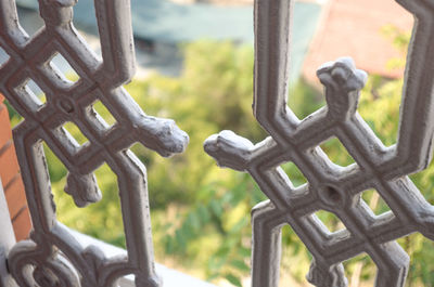 Close-up of rusty metal fence