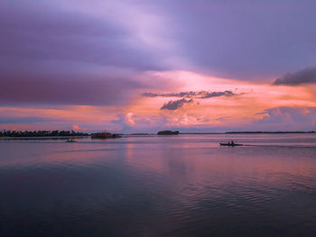 Scenic view of sea against sky at sunset