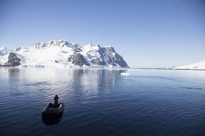 Man on boat in the antarctic