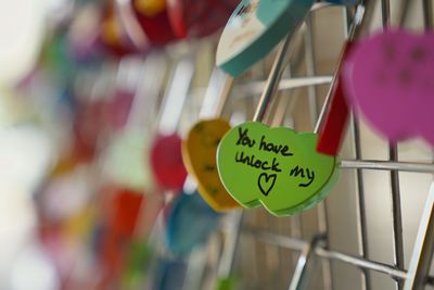 Close-up of heart shape hanging on display at market stall