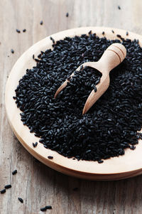 High angle view of black coffee on table