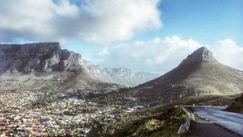 Landscape with city and mountains