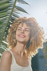 Portrait of young woman looking away