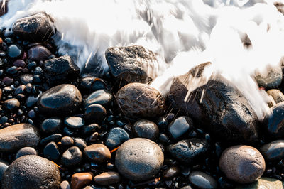 Close-up of pebbles on beach