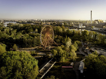 High angle view of trees and buildings against sky