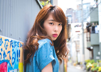 Portrait of a beautiful young woman looking away