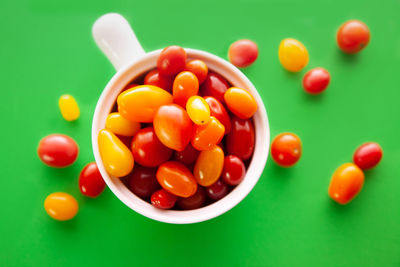 High angle view of tomatoes on white background