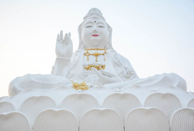 Beautiful white statues of the ancient guanyin are large