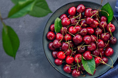 Directly above shot of cherries in bowl