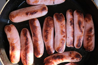 High angle view of meat on barbecue grill