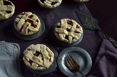 Homemade cherry mini pies and blueberry mini pies