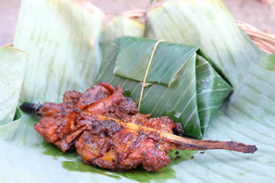 Close-up of meat on barbecue grill