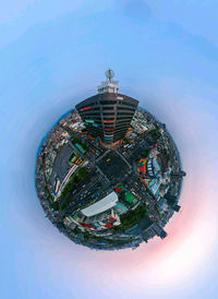 Aerial view of cityscape against sky