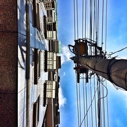 Low angle view of built structure against blue sky