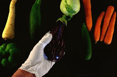 Close-up of hand holding fruit