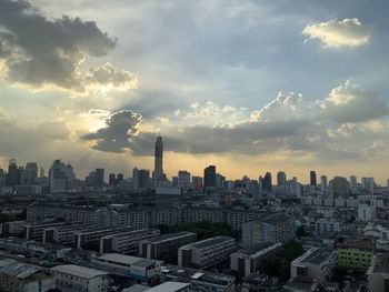 Cityscape against sky during sunset
