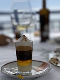 Close-up of coffee served on table