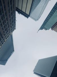 Low angle view of modern buildings against sky